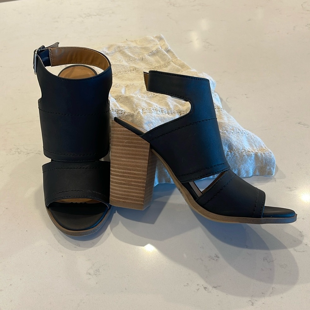 Dolce Vita black leather chunky heeled sandal.  Worn once, excellent condition!